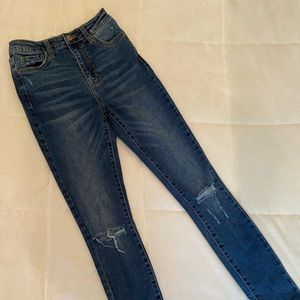 Ripped High Rise Jeans